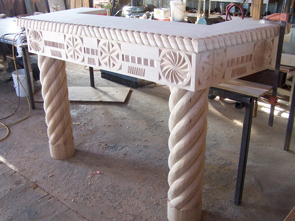 Wood Mantle Fireplace Surrounded with Columns